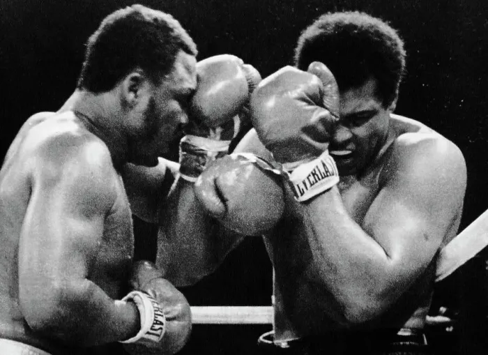 Framed Print : Muhammad Ali Covers As Joe Frazier Punch Framed Print : Muhammad Ali Covers As Joe Frazier Punch