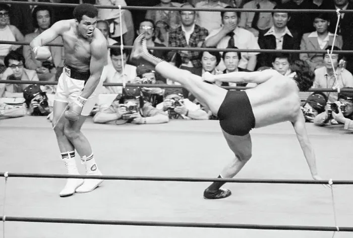 Framed Print : Muhammad Ali Dodges Kick of Japanese Wrestler Framed Print : Muhammad Ali Dodges Kick of Japanese Wrestler