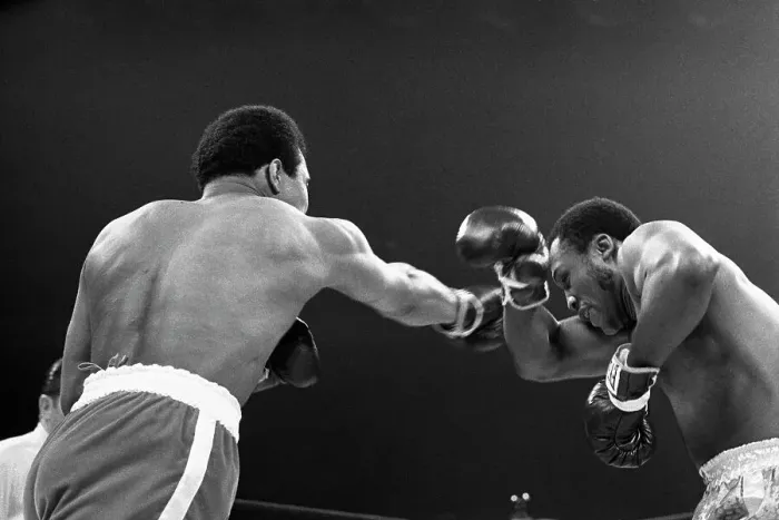 Framed Print : Muhammad Ali Punching Joe Frazier Framed Print : Muhammad Ali Punching Joe Frazier