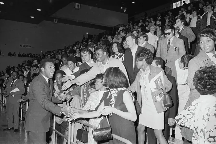 Framed Print : Muhammad Ali Shaking Hands with Students Framed Print : Muhammad Ali Shaking Hands with Students