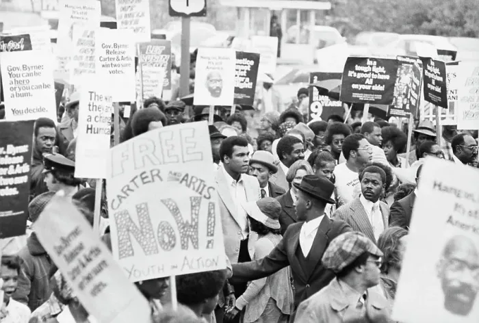 Framed Print : Muhammad Ali Standing Behind Now Sign Along with Protesters Framed Print : Muhammad Ali Standing Behind Now Sign Along with Protesters