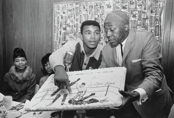 Framed Print : Muhammad Ali With Victory Cake