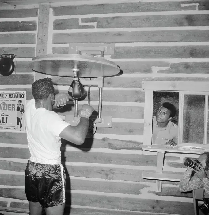 Framed Print : Muhammad Ali Watching Floyd Patterson Through Window