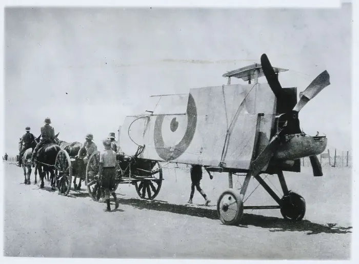 Framed Print : Mule Team Transporting Military Plane