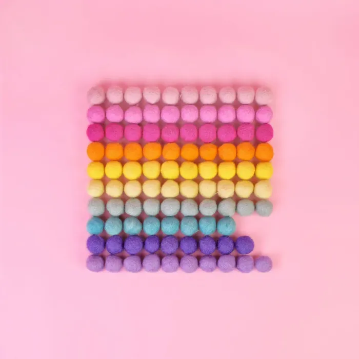 Framed Print : Multicolored wool balls in a row Framed Print : Multicolored wool balls in a row