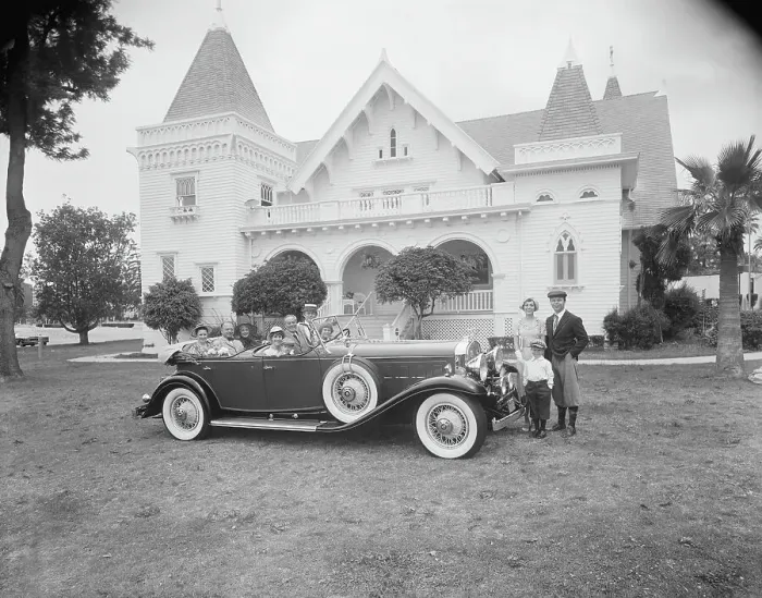 Framed Print : Multigeneration family in car and outside car in front of house Framed Print : Multigeneration family in car and outside car in front of house