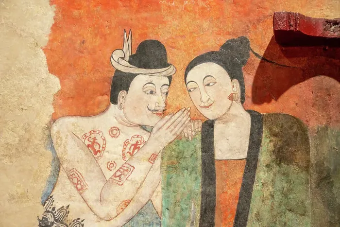 Framed Print : The mural painting of a man whispering to the ear of a woman. at Wat Phumin, a famous temple in Nan province, Thailand Framed Print : The mural painting of a man whispering to the ear of a woman. at Wat Phumin, a famous temple in Nan province, Thailand