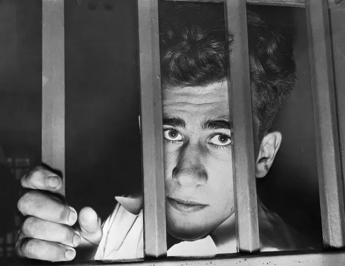 Framed Print : Murder Suspect Looking from Behind Bars Framed Print : Murder Suspect Looking from Behind Bars