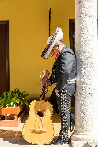 Musician with sombrero doing a siesta, Yucatan, Mexico