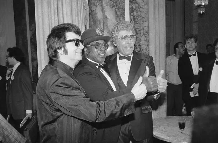 Framed Print : Musicians Celebrating at Black Tie Dinner Framed Print : Musicians Celebrating at Black Tie Dinner