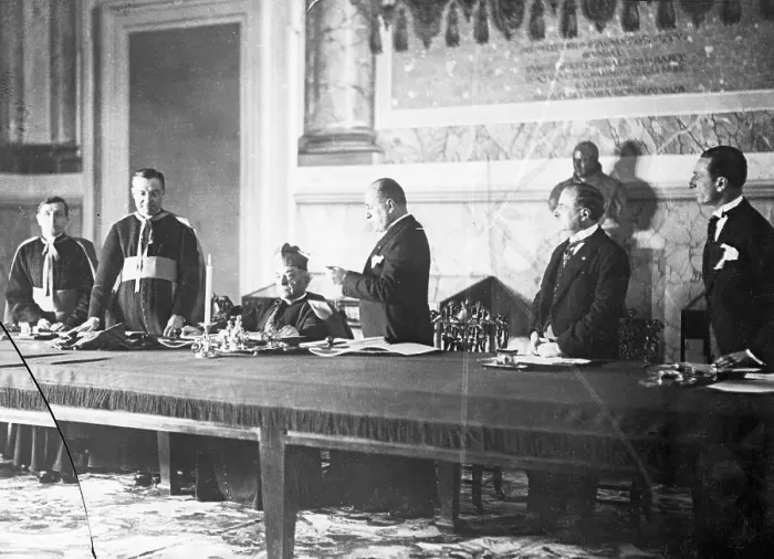 Framed Print : Mussolini Reads Pact to Vatican Officials Framed Print : Mussolini Reads Pact to Vatican Officials