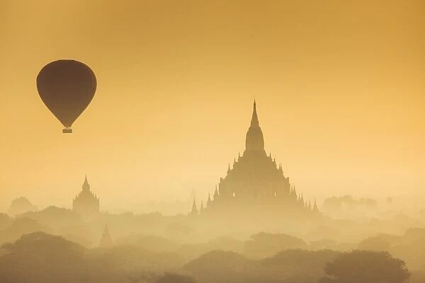 Myanmar, Bagan, air balloon flying over temples