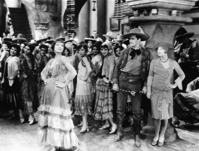 Framed Print : Myrna Loy. circa 1934: American actress Myrna Loy struts her stuff in a Mexican bar scene