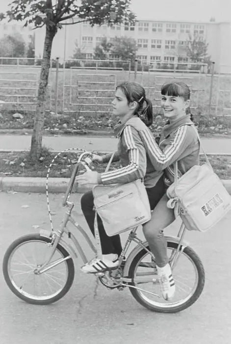 Framed Print : Nadia Comaneci and Friend Riding Bicycle Framed Print : Nadia Comaneci and Friend Riding Bicycle