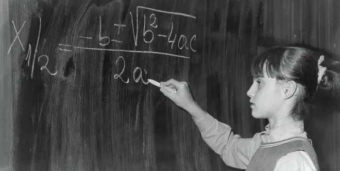 Framed Print : Nadia Comaneci Writing on Blackboard at School Framed Print : Nadia Comaneci Writing on Blackboard at School