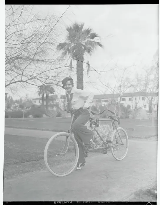 Framed Print : Nancy Carroll Riding Bicycle