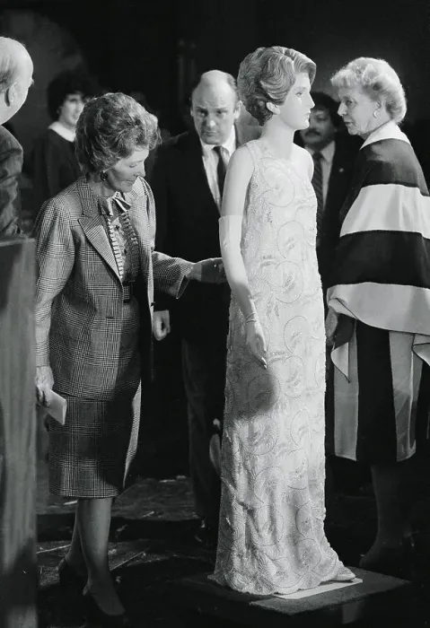 Framed Print : Nancy Reagan Inspecting a Ball Gown Framed Print : Nancy Reagan Inspecting a Ball Gown