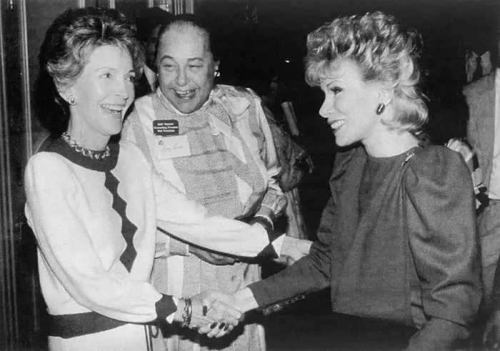 Framed Print : Nancy Reagan Shaking Hands with Joan Rivers Framed Print : Nancy Reagan Shaking Hands with Joan Rivers