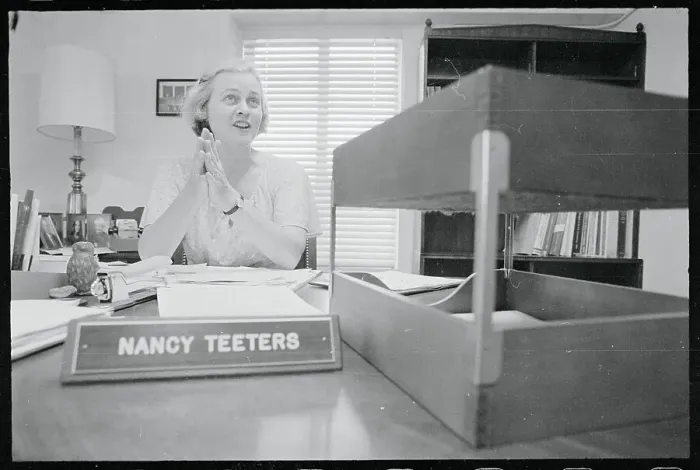 Framed Print : Nancy Teeters Sitting at Her Desk Framed Print : Nancy Teeters Sitting at Her Desk