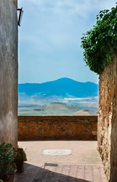 Framed Print : Narrow alley overlooking a rolling hill landscape Framed Print : Narrow alley overlooking a rolling hill landscape