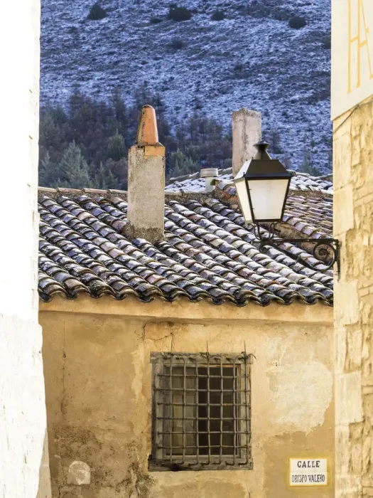 Framed Print : Narrow street with snow covered roof in the city of Cuenca Framed Print : Narrow street with snow covered roof in the city of Cuenca
