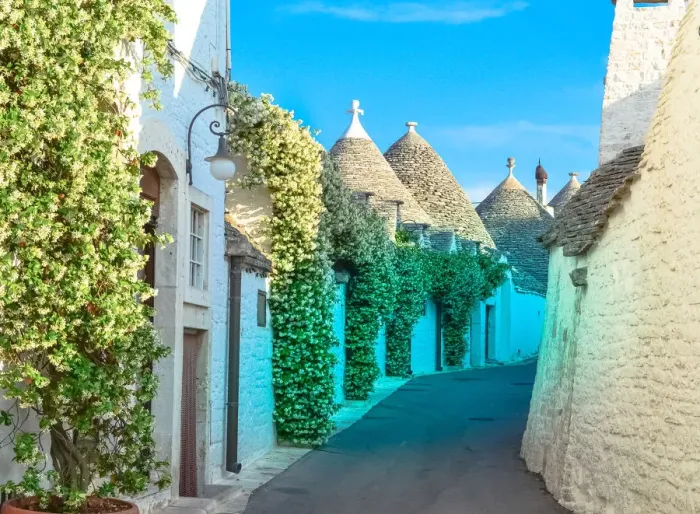 Framed Print : Narrow street with trulli houses in Alberobello Framed Print : Narrow street with trulli houses in Alberobello