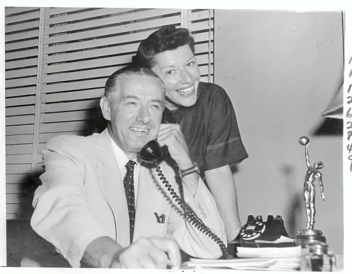 Framed Print : Nat Holman Talking on Phone with Wife and Basketball Trophy Nearby