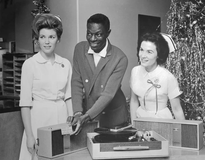 Framed Print : Nat King Cole with Two Nurses Framed Print : Nat King Cole with Two Nurses