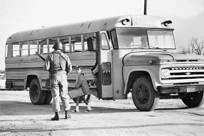 Framed Print : National Guardsman Meeting School Bus Framed Print : National Guardsman Meeting School Bus