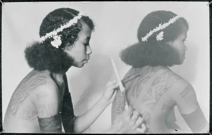 Framed Print : Native Girl Tattooing Another's Back Framed Print : Native Girl Tattooing Another's Back