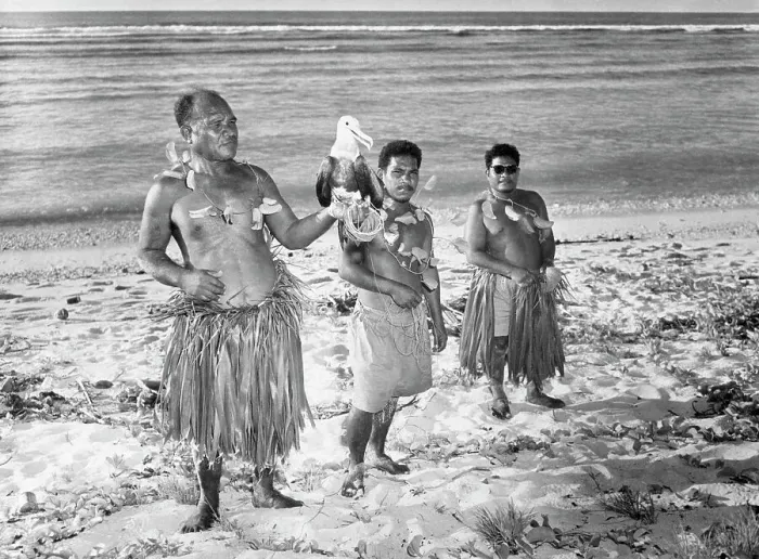 Framed Print : Native People Standing on Shoreline with Bird Framed Print : Native People Standing on Shoreline with Bird