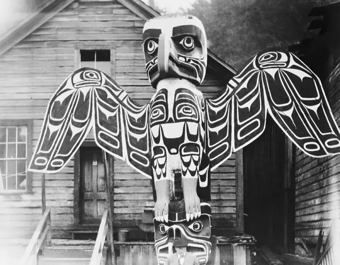 Framed Print : Native Totem Pole in Front of Building Framed Print : Native Totem Pole in Front of Building