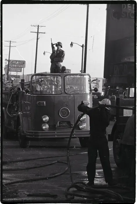 Framed Print : Nat'L Guardsman Standing On Fire Truck Framed Print : Nat'L Guardsman Standing On Fire Truck