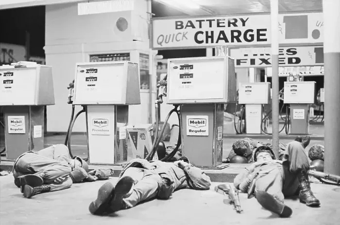 Framed Print : Nat'L Guardsmen Sleeping Near Gas Pumps Framed Print : Nat'L Guardsmen Sleeping Near Gas Pumps