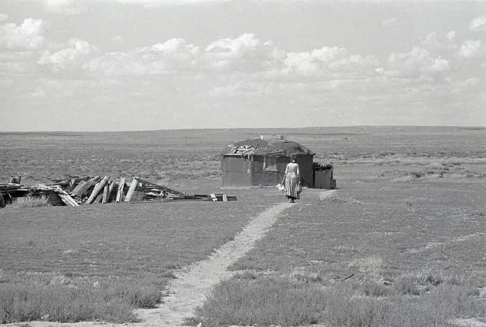 Framed Print : Navajo Woman Walking Towards Hogan Framed Print : Navajo Woman Walking Towards Hogan