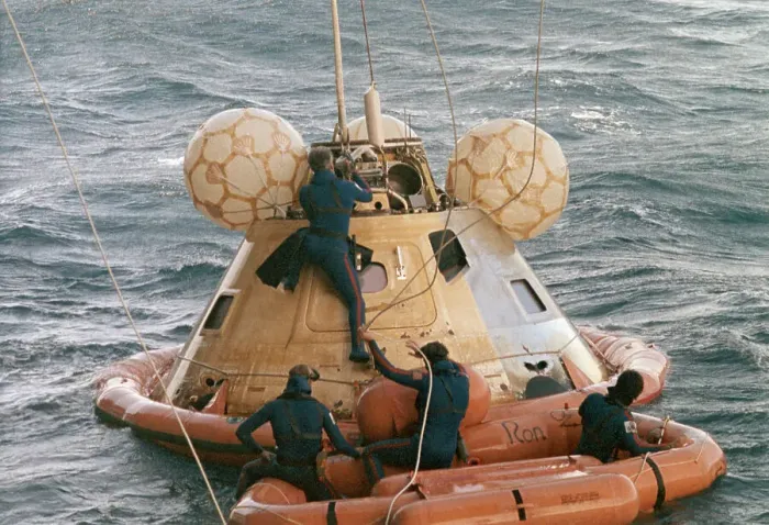 Framed Print : Navy Divers Climb on Spacecraft in Ocean Framed Print : Navy Divers Climb on Spacecraft in Ocean