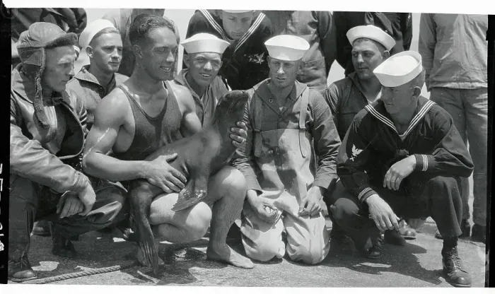 Framed Print : Navy Men Holding Their Mascot Framed Print : Navy Men Holding Their Mascot