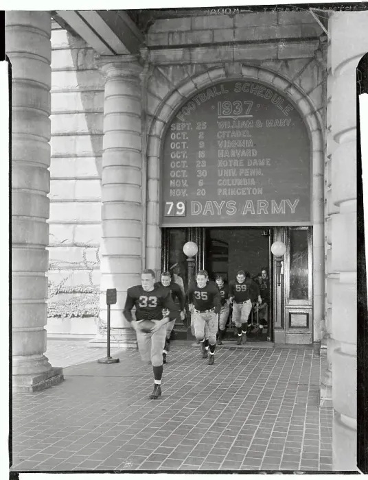 Framed Print : Navy Varsity Football Team Running Through Doorway Framed Print : Navy Varsity Football Team Running Through Doorway