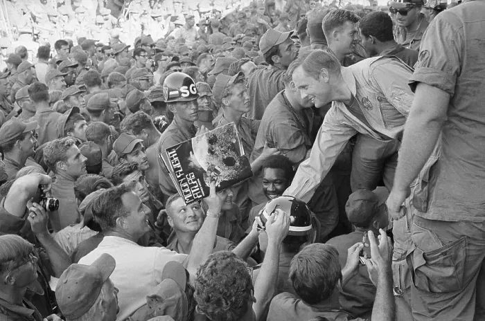 Framed Print : Neil Armstrong Shaking Hands with Soldiers Framed Print : Neil Armstrong Shaking Hands with Soldiers