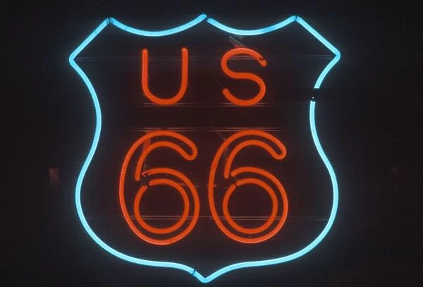 A neon sign that reads ?US 66?