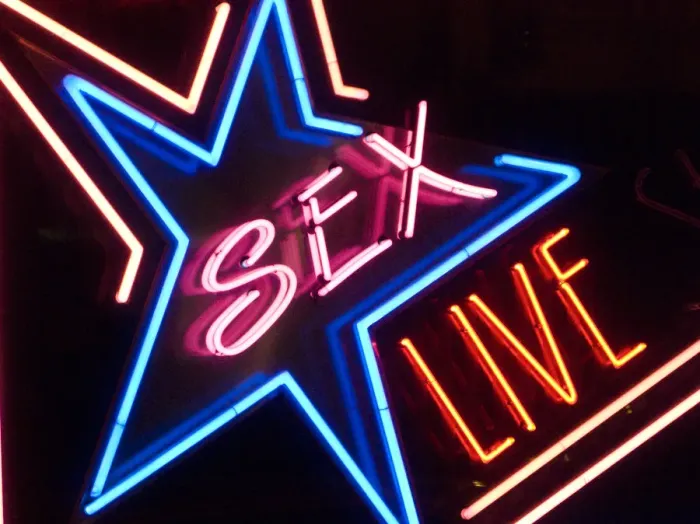 Framed Print : Neon sign in a red light district, with the lettering Sex Live Framed Print : Neon sign in a red light district, with the lettering Sex Live