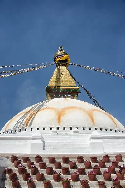 Nepal, Kathmandu, Bodnath, Stupa sanctuary with prayer flags