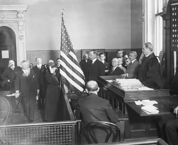 Framed Print : New Citizens Pledge on Flag in Courtroom Framed Print : New Citizens Pledge on Flag in Courtroom