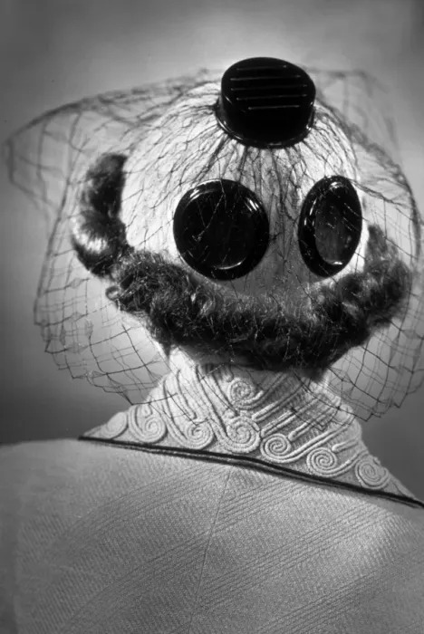 Framed Print : A New Hat. 15th March 1937: The back view of a hat decorated with large buttons and net,