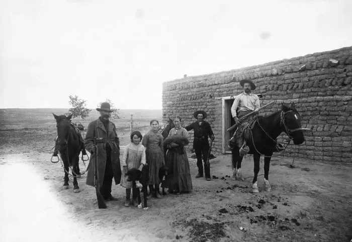 Framed Print : New Mexican Settlers In Front Of House Framed Print : New Mexican Settlers In Front Of House