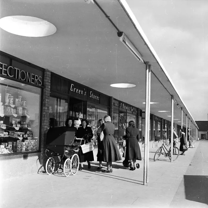 Framed Print : New Shops. 27th March 1954: A group of mothers meet in the shopping centre Framed Print : New Shops. 27th March 1954: A group of mothers meet in the shopping centre