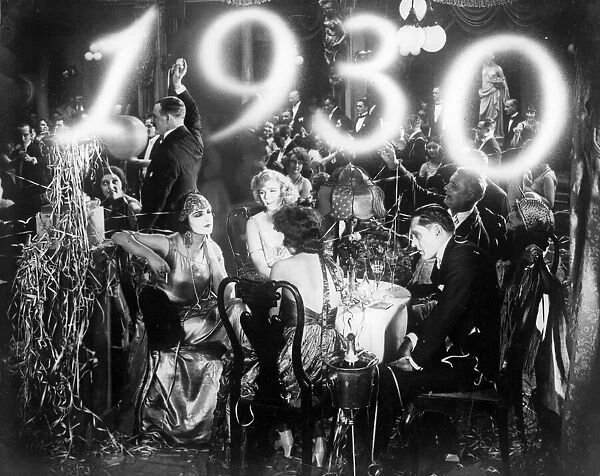 New Year. 1930: Streamers and champagne for revellers at a New Years party