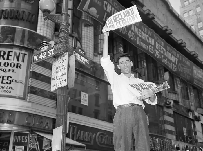 Framed Print : Newsboy Holds Paper with War Declaration Framed Print : Newsboy Holds Paper with War Declaration