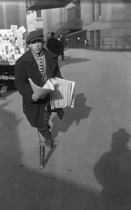 Framed Print : Newsboy with Wooden Leg Running to Make Sale Framed Print : Newsboy with Wooden Leg Running to Make Sale