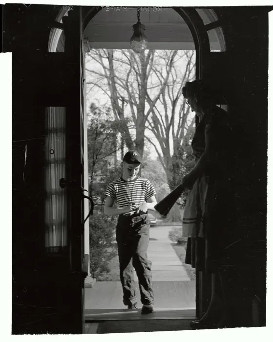 Framed Print : Newsboy Writing Information of New Customer Framed Print : Newsboy Writing Information of New Customer